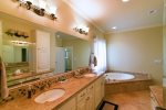 Dual vanities and large soaking tub